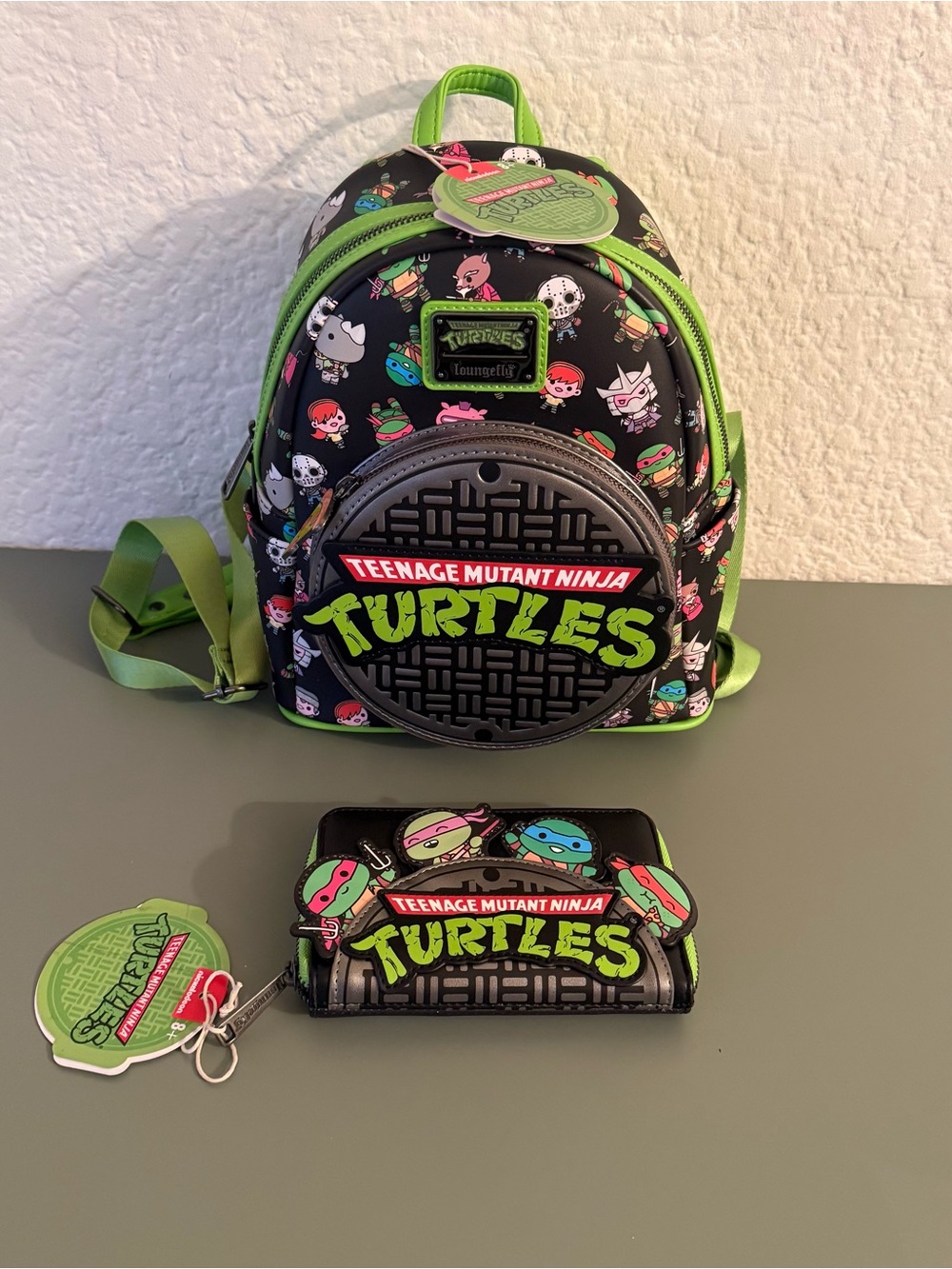 Loungefly: Teenage Mutant Ninja Turtles Sewer Cap AOP Mini Backpack and Wallet